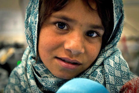 After a routine check-up with U.S. Army doctors assigned to the 745th Forward Surgical Team, attached to Task Force Bastogne, 1st Brigade Combat Team, 101st Airborne Division, 8-year-old Nazawaly Uddin gives a shy smile before leaving Forward Operating Base Fenty, Afghanistan, April 18th. Nazawaly, whose hand was crippled for more than two years, should regain full use in a few months. (Photo by U.S. Army Sgt. 1st Class Mark Burrell, Task Force Bastogne Public Affairs)