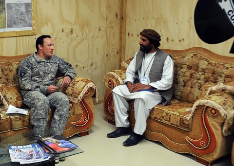 Hami Dullha, the Paktika Province’s director of the Department of Agriculture, Irrigation, and Livestock, discusses progress of the province’s watershed program with U.S. Army Maj. Stephen L. Battle, the civil affairs officer from 4th Brigade Combat Team, 101st Airborne Division, during his visit April 9th at Forward Operating Base Sharana in Paktika Province, Afghanistan. (Photo by U.S. Army Spc. Kimberly K. Menzies, Task Force Currahee Public Affairs)