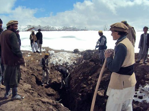 Afghans prepare a river bed for check-dams as part of the provincial watershed restoration program in Paktika Province, Afghanistan. Hami Dullha, Paktika Province’s director of the Department of Agriculture, Irrigation and Livestock, discussed the purpose and plans for this program with Task Force Currahee staff members during his first visit to Forward Operating Base Sharana in Paktika Province, Afghanistan, April 9th. (Courtesy Photo)