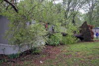 Two trees fell down on this trailer located on Batts Lane. (Photo by Jim Knoll-CPD)