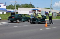 Motorcycle collides with Ford Escort. (Photo by CPD-Jim Knoll)