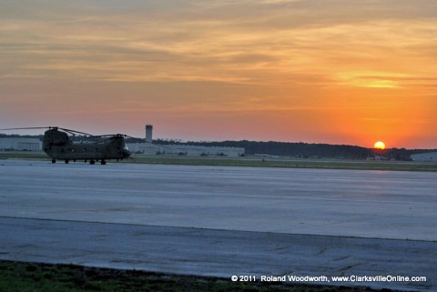 The sun sets over Campbell Army Airfield as friends and family await the arrival of the flight bringing their loved ones home. 