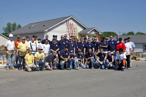 24 members of 3rd Platoon, B Co., 3rd Battalion, 187th Infantry Regiment, 101st Airborne Division, post in front of a nearly-complete home with other Habit for Humanity volunteers May 8th. The paltoon participated in a Mother's Day Habitat for Humanity home build, helping finish the exteriors of four homes on Ewing Drive in Nashville, TN. (U.S. Army Courtsey Photo)