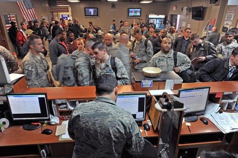 Hopeful passengers wait for processing at the 455th Expeditionary Aerial Port Squadron's passenger terminal, Bagram Airfield, Afghanistan. Recently, the squadron broke their-own record of 50,748 passengers moved in one day set January 2011. Last month, due mainly to the rotation of the Army's 101st Airborne Division with 1st Cavalry from Fort Hood, TX, Bagram 2T2X1s moved 59,327 passengers in and out of the country. (U.S. Air Force photo by Senior Airman Sheila deVera)