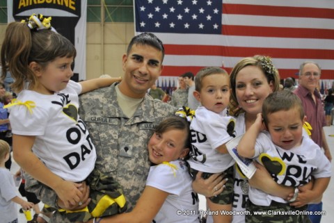 SPC Mark Gurule along with his wife Jessica and their four children.
