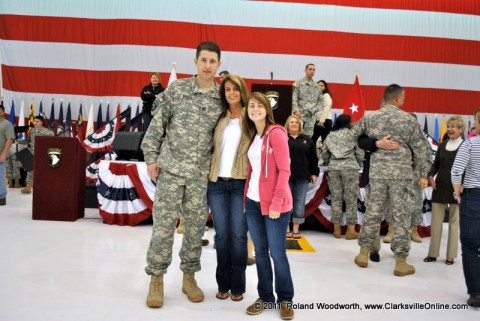 CPT John Mayo with his wife Lisa and their daughter