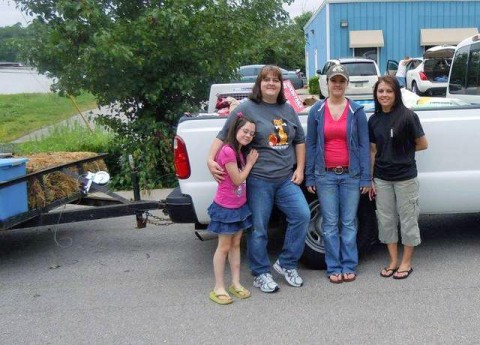 Emily Shaver and Humane Society Director Amy Shaver helped load up pet supplies so local volunteers Hannah and Haly Baggett could transport the items to Alabama this weekend. (Photo by Amy Shaver)