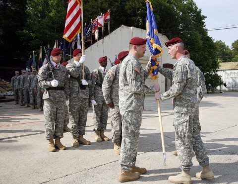 Maj. Mark Kappelmann (left) accepts the unit colors from Col. John Thompson, commander, 160th Special Operations Aviation Regiment, as he assumes command of the Special Operations Aviation Training Battalion from Lt. Col. Brian Hughes during a ceremony at Fort Campbell, KY, May 20th, 2011. Hughes is assuming command at Fort Riley, Kansas. (Photo courtesy of the 160th Special Operations Aviation Regiment)