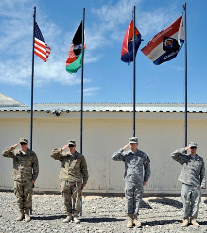 (From Left to Right) U.S. Air Force Senior Airmen Eric Shaner, U.S. Air Force 1st Lt. Lars Swanson, U.S. Army Sgt. Karl Keller,  and U.S. Army Spc. Tommy Rowland, all attached to Task Force Currahee, 4th Brigade Combat Team, 101st Airborne Division render a salute May 21st, in recognition of Armed Forces Day.  (Photo by U.S. Army Sgt. Luther L. Boothe Jr., Task Force Currahee Public Affairs)