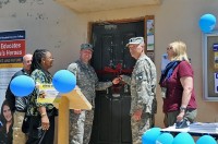 Deputy commander of Task Force Currahee, 4th Brigade Combat Team, 101st Airborne Division, U.S. Army Lt. Col. Darrin Ricketts, and U.S. Army Command Sgt. Maj. Gary R. Holder, 801st Brigade Support Battalion, 4th BCT, 101st Airborne Div., cut the ribbon during the grand opening of the Sharana Education Center on Forward Operating Base Sharana, Afghanistan, April 30th. (Photo by U.S. Army Staff Sgt. Todd Christopherson, Task Force Currahee Public Affairs)