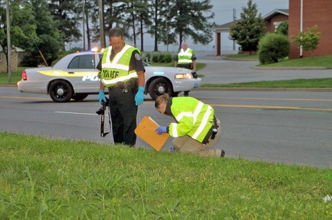 Officer Derrick Cronk and Officer Melissa Spielhagen on scene investigating the hit and run. (Photo by CPD-Jim Knoll)