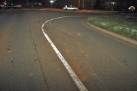 Marks on the road left from the skidding motorcycle. (Photo by CPD-Jim Knoll)