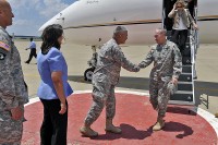 The Chief of Staff of the Army (CSA) General Martin E. Dempsey is greeted by Maj. Gen. John F. Campbell during a visit to Fort Campbell where he and his wife Deanie met with Soldiers and their spouses Thursday, 23rd June, 2011. "They have really written another page in their extensive history and I think it's one of those places you come to remember, why we do what we do," he said. (Official Army photo by: Jerry Woller)