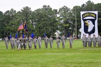 The commander of troops, Maj. Elizabeth Martin, 5th Battalion, 101st Aviation Regiment executive officer, posts the colors in preparation for honors to the nation during the 5th Battalion, 101st Aviation Regiment, 101st Combat Aviation Brigade change of command ceremony at Fort Campbell, KY, June 22nd. The outgoing battalion commander is Lt. Col. John Kline and the incoming commander is Lt. Col. Christopher Waters.