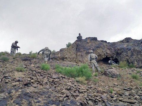 Soldiers from “Reapers”, the Mortar Platoon, 1st Battalion, 506th Infantry Regiment, TF Red Currahee, 4th Brigade Combat Team, 101st Airborne Division, TF Currahee, clear a cave and secure the area where they will provide indirect fire support during Operation Red Storm. (Photo by U.S. Army Staff Sgt. Matt Graham, Task Force Currahee Public Affairs)