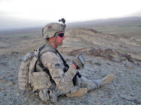 U.S. Army Pfc. Kruszka from the Mortar Platoon, 1st Battalion, 506th Infantry Regiment, TF Red Currahee, 4th Brigade Combat Team, 101st Airborne Division, TF Currahee, rests after climbing to a mountain top near the area where his platoon secured key terrain. His platoon provided indirect fire support during Operation Red Storm which cleared the Gwashta Pass in Paktika Province, Afghanistan, May 23rd-28th. (Photo by U.S. Army Staff Sgt. Matt Graham, Task Force Currahee Public Affairs)