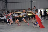 U.S. Army Soldiers from 4th Brigade Combat Team, 101st Airborne Division, Task Force Currahee, compete in a limbo competition during a special event celebrating Asian Pacific Heritage Month at Forward Operating Base Sharana, Afghanistan, May 29th. (Photo by U.S. Army Sgt. Christina Sinders, Task Force Currahee Public Affairs)