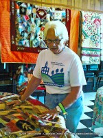 Melba Whitlow Smith with the Crazy Quilt created by Nanny Ramsey in 1894