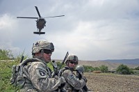 Solders from 1st Squadron, 61st Cavalry Regiment, Task Force Panther, 4th Brigade Combat Team, 101st Airborne Division, attached to 3rd Brigade Combat Team, 25th Infantry Division, Task Force Bronco, patrol the Memlah area, Afghanistan, before a key leader engagement, June 13th. (Spc. Hillary Rustine)