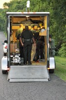 Officers observing Robot video. (CPD-Jim Knoll)