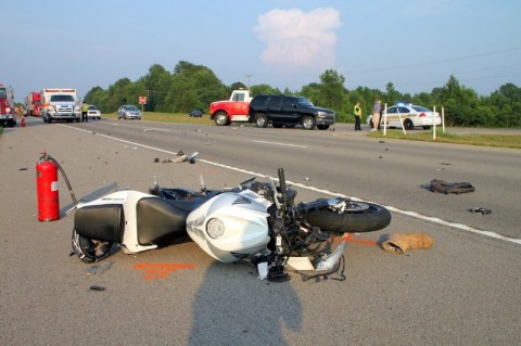 Honda motorcycle collided with the Tahoe, throwing the rider, and continued on without the rider to collided with a Nissan Versa. (Photo by CPD Jim Knoll)