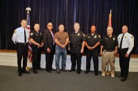 (Left to Right) Chief Ansley, Officer Ortiz, Officer Dailey, Officer Brown, Lt Carney, Lt Tucker, Officer Bechtold, DC Parr. (CPD-Jim Knoll)