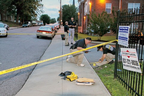 Clarksville Police Officers investigate the crime Scene at University Landing Apartments parking lot where an overnight shooting occurred, June 19th, that left one man dead and another in the hospital in stable condition. (CPD Public Information Officer Jim Knoll)