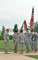 Lieutenant Col. David G. Thompson receives the 716th Military Police colors in the battalion’s change of command ceremony outside of 101st Airborne Division Headquarters Tuesday. (Photo by Megan Locke, Courier)