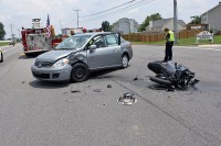 A 2008 Nissan Versa pulled out in front of a 2009 Kawasaki motorcycle causing the motorcycle to collide with the car. (Photo by CPD Officer Derrick Cronk)