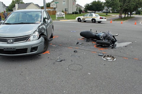 A 2008 Nissan Versa pulled out in front of a 2009 Kawasaki motorcycle causing the motorcycle to collide with the car. (Photo by CPD Officer Derrick Cronk)