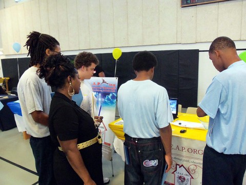 People stopping by LEAP Organization booth at the Woodland Hills Career Fair (Photo by Richard Garrett)