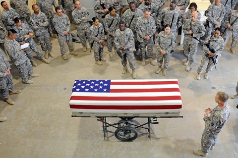 Soldiers with the 101st Sustainment Brigade listen attentively as they receive a block of instruction on conducting mortuary affairs at the Mortuary Affairs Collection Point at Bagram Air Field, Afghanistan, in March 2011. The brigade and the 101st Special Troops Battalion provided critical support to the MACP who processed the recent fallen members of the special operations forces team killed this past week when a rocket-propelled grenade struck their Chinook in Afghanistan. (Photo by Sgt. 1st Class Peter Mayes)