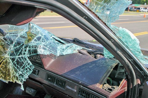 Oldsmobile which collided with the pedestrian. (Photo by Jim Knoll - CPD) Oldsmobile which collided with the pedestrian. (Photo by Jim Knoll - CPD)