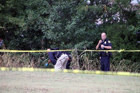 Clarksville Police investigate the scene where the deceased male body was found. (Photo by CPD)