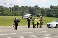 Taking child to Lifeflight. (Photo by CPD – Jim Knoll)