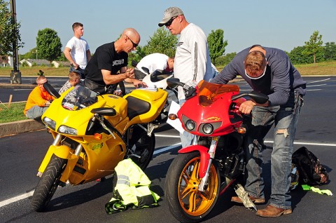 Soldiers of 2nd Battalion, 502nd Infantry Regiment, 2nd Brigade Combat Team, 101st Airborne Division (Air Assault), inspect their motorcycles at the ‘Ride for the Fallen’ training event, in Clarksville, TN, August 26th. Strike Force hosted the event to train motorcyclists on basic biking skills and dedicated their ride from Clarksville to Nashville, TN in honor their fallen Soldiers from Operation Enduring Freedom 2010-2011. (U.S. Army Photo By Spc. Shawn Denham, PAO)