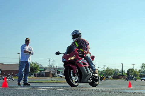 Pfc. Cord Robedeau, a mortarman with Headquarters and Headquarters Company, 2nd Battalion, 502nd Infantry Regiment, 2nd Brigade Combat Team, 101st Airborne Division (Air Assault), practices basic motorcycle control during the training portion of ‘Ride for the Fallen’, in Clarksville, TN, August 26th. Soldiers of Strike Force gathered to learn motorcycle riding and safety, then rode along Highway 41-A to Nashville, TN, in remembrance of their fallen comrades from Operation Enduring Freedom 2010-2011. (U.S. Army Photo By Spc. Shawn Denham, PAO)