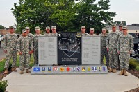 Soldiers with 2nd Brigade Combat Team, 101st Airborne Division (Air Assault), who served through four tours, stand around Strike Brigade’s monument to its fallen Soldiers of Operation Enduring Freedom 2010-2011, at Fort Campbell, KY, earlier this month. The monument contains the names of 66 personnel serving with Strike Brigade, and the locations of key facilities maintained during the deployment. (U.S. Army Photo By Sgt. Joe Padula, PAO, 2nd BCT, 101st Abn. Div.)