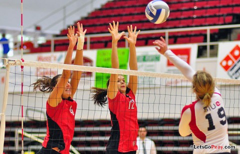 Senior Kayla Grantham and sophomore Lauren Henderson attempt to stop SIUE's Julia Whitfield, Saturday, SIUE won a five-set contest at the Dunn Center. APSU Volleyball. (Courtesy: Cidnie Sydney-Brewington/APSU)