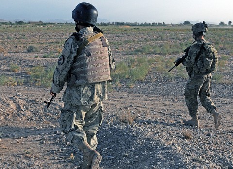 Members of the 2nd Afghan National Civil Order Police SWAT team and the Task Force Thunder Kandahar Pathfinder Detachment conduct a patrol September 4th. (Photo by Sgt. 1st Class Stephanie Carl, 159th Combat Aviation Brigade Public Affairs)