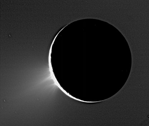 Water vapor and ice erupt from Saturn's moon Enceladus, the source of a newly discovered donut-shaped cloud around Saturn.