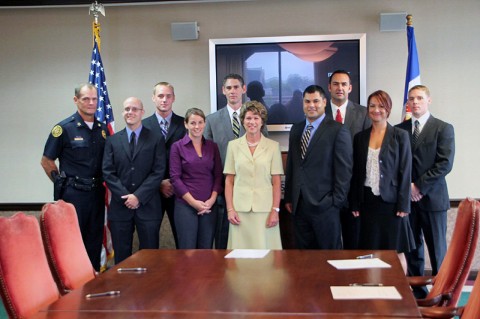 Left to Right - Chief Al Ansley, Joseph Van Neste, Jesse Scott, Colleen Sala, John Neal, Mayor Kim McMillan, Adrian Anderson, Craig Chatigny, Sunisa Bridgforth, Justin Neagos. (Photo by Jim Knoll-CPD Public Information Officer)