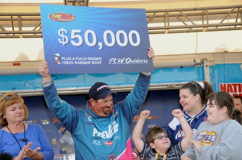 Dan Morehead celebrates his victory in the EverStart Series Championship with his family. (Photo by Rob Newell)