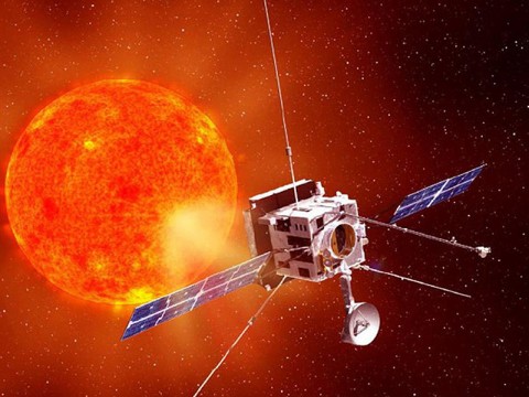 Artist's concept of the Solar Orbiter viewing the sun. (Photo Credit: ESA)