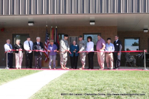 Rita Nicholson, the daughter of Col. Robert E. Jones cuts the ribbon to the new facility with Col. William B. Hickman the Deputy Commander of Operations for the 101st Airborne Division