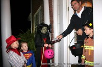 Paisley (5), Crispin (4), and Alessandra (9) were singing the Halloween song for Mark Williams and  the neighbor son John (6)