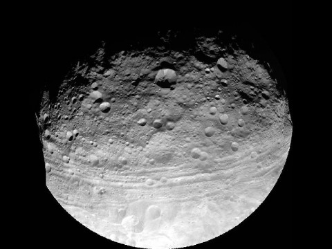 This full view of the giant asteroid Vesta was taken by NASA's Dawn spacecraft, as part of a rotation characterization sequence on July 24th, 2011, at a distance of 3,200 miles (5,200 kilometers). A rotation characterization sequence helps the scientists and engineers by giving an initial overview of the character of the surface as Vesta rotated underneath the spacecraft. (Image credit: NASA/JPL-Caltech/UCLA/MPS/DLR/IDA)