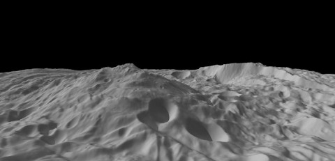 This image of the asteroid Vesta, calculated from a shape model, shows a tilted view of the topography of the south polar region. The image has a resolution of about 1,000 feet (300 meters) per pixel, and the vertical scale is 1.5 times that of the horizontal scale. (Image credit: NASA/JPL-Caltech/UCLA/MPS/DLR/IDA/PSI)