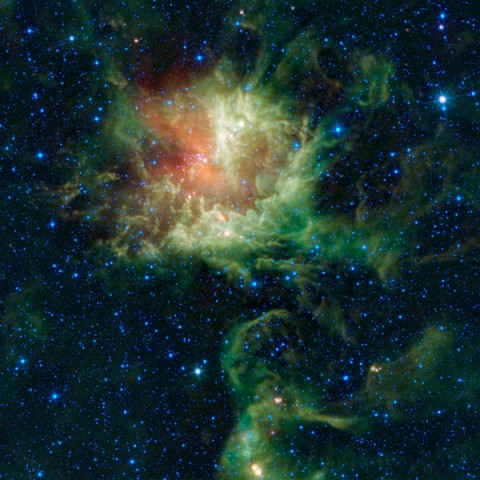 In visible light, the star-forming cloud catalogued as NGC 281 in the constellation of Cassiopeia appears to be chomping through the cosmos, earning it the nickname the "Pacman" nebula after the famous Pac-Man video game of the 1980s. (Image Credit: NASA/JPL-Caltech/UCLA)