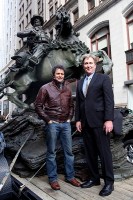 Douwe Blumberg, the artist and sculptor of the De Oppresso Liber statue, and Mr. Doug Stanton, author of the book Horse Soldiers, stand in front of the 18-foot bronze statue prior to the start of the New York City Veterans Day Parade, Nov. 11th, 2011. (Photo courtesy of Spec. Kerry Otjen)